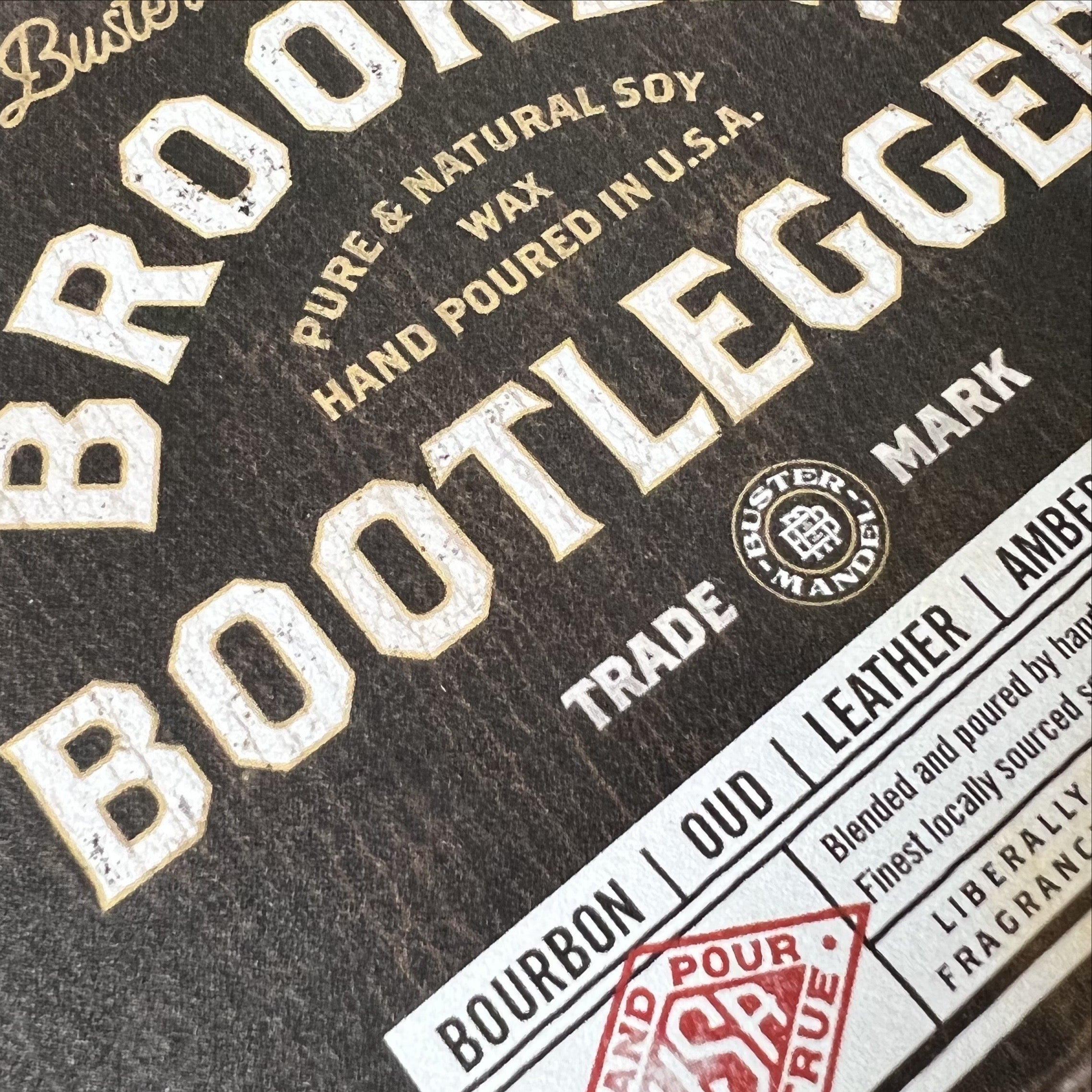 Brooklyn Bootlegger Candle by Buster Mandel – close-up of vintage-inspired label featuring bold typography and rugged Prohibition-era design. Hand-poured in the USA