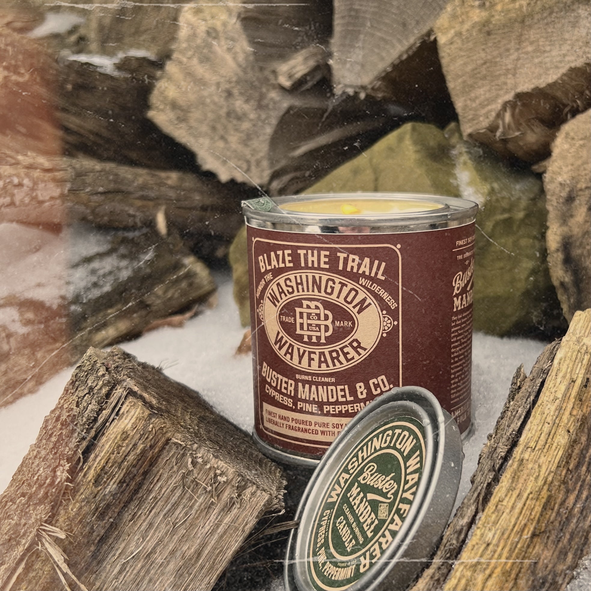 Luxury masculine candle from Buster Mandel, the Washington Wayfarer – an outdoorsy, smoky, and woodsy soy candle perfect for man cave décor and rugged gifts for outdoorsy men. Made in the USA.