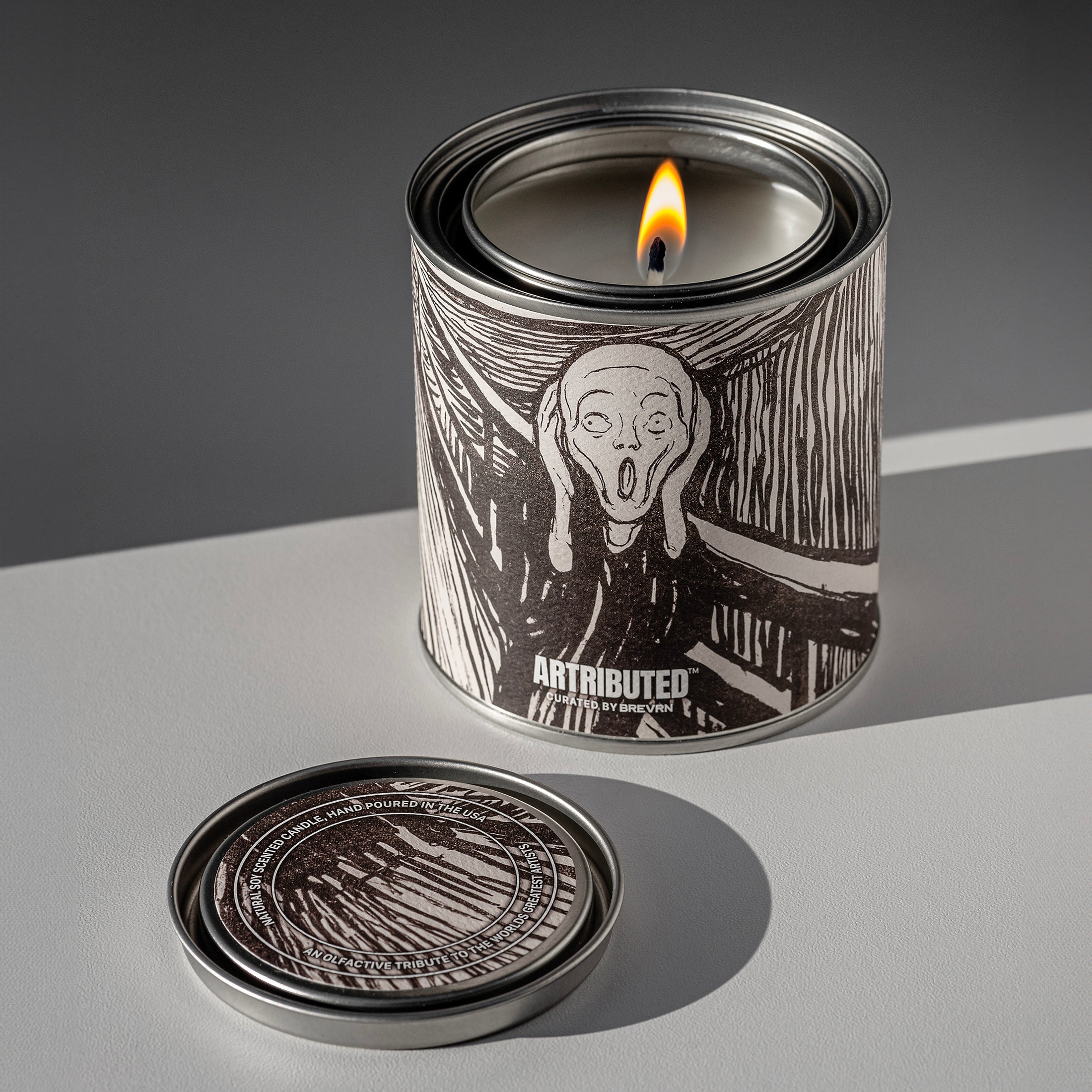 A lit candle featuring the famous painting The Scream of Nature by Edvard Munch