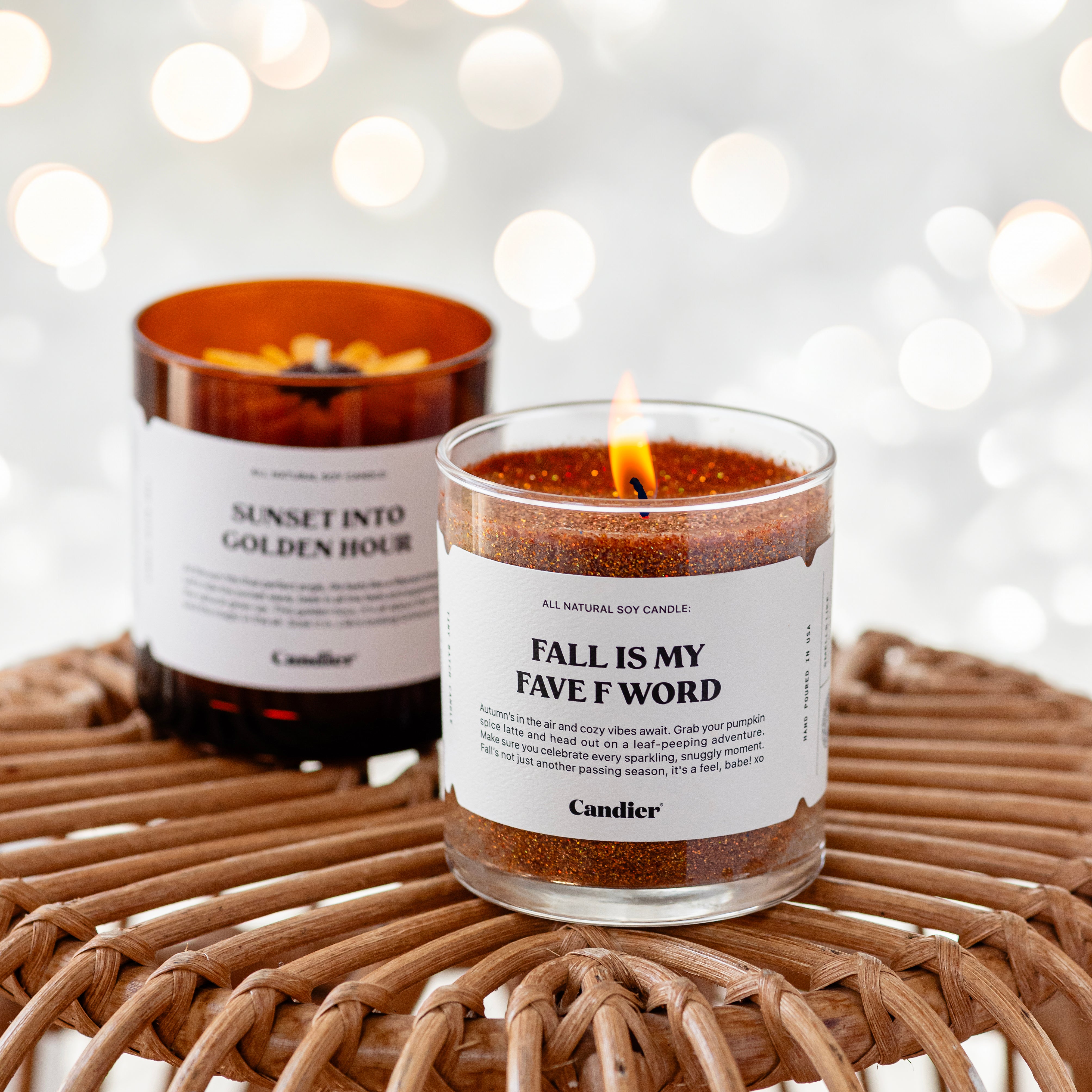 a fall candle with autumn colored sparkling glitter and a label that reads Fall Is My Fave F Word