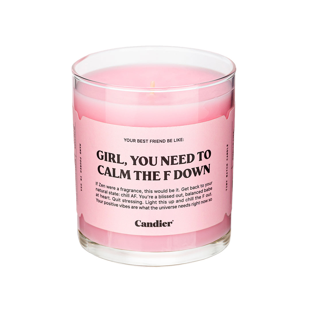 A pink "Girl, You Need To Calm The F Down" candle by Candier, a calming and relaxing soy wax candle with a clean burn.