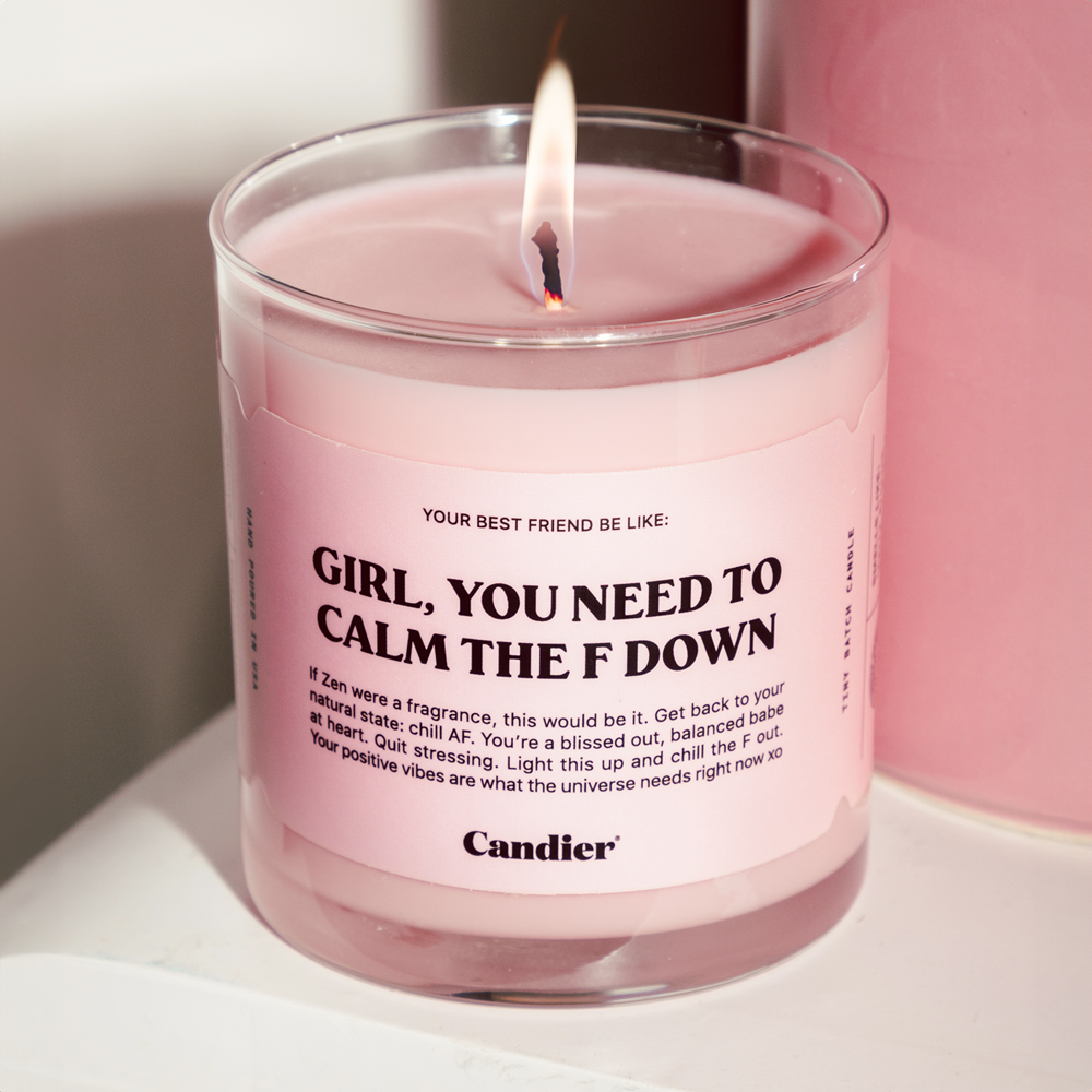 A detailed view of the "Girl, You Need To Calm The F Down" candle, highlighting its aesthetic pink wax and fun sassy messaging. Perfect gift for teen girls