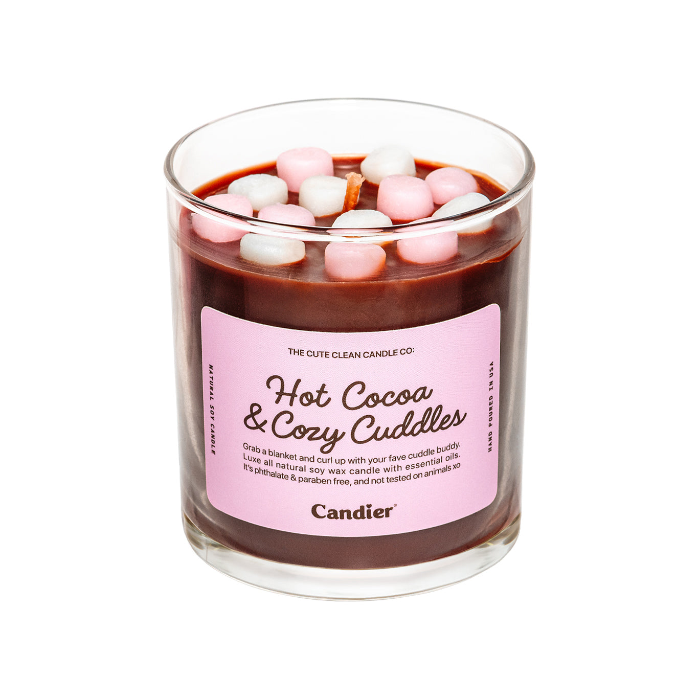 A cute pink candle that is hot chocolate themed with mini wax marshmallows and a label that reads Hot Cocoa & Cozy Cuddles by Candier® candles