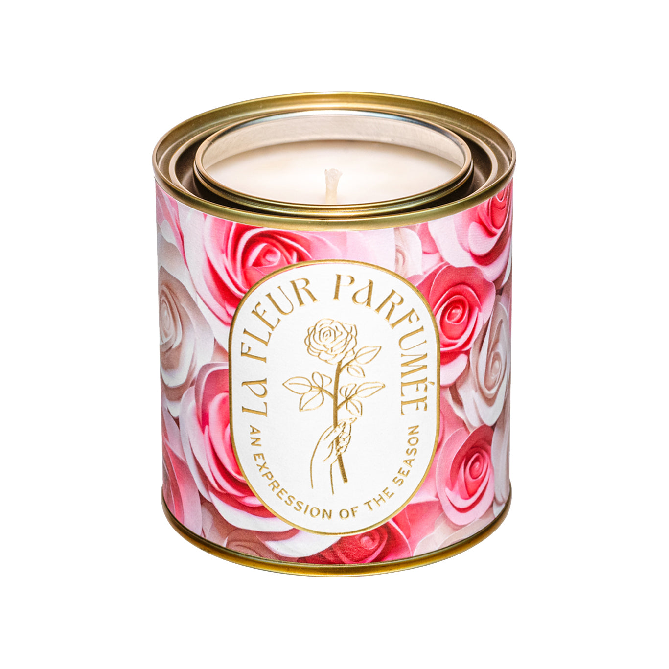 Luxury soy rose candle with elegant gold logo that reads La Fleur Parfumeé An Expression of the Season. The gold tone metal vessel is decorated with artwork of pink and cream roses