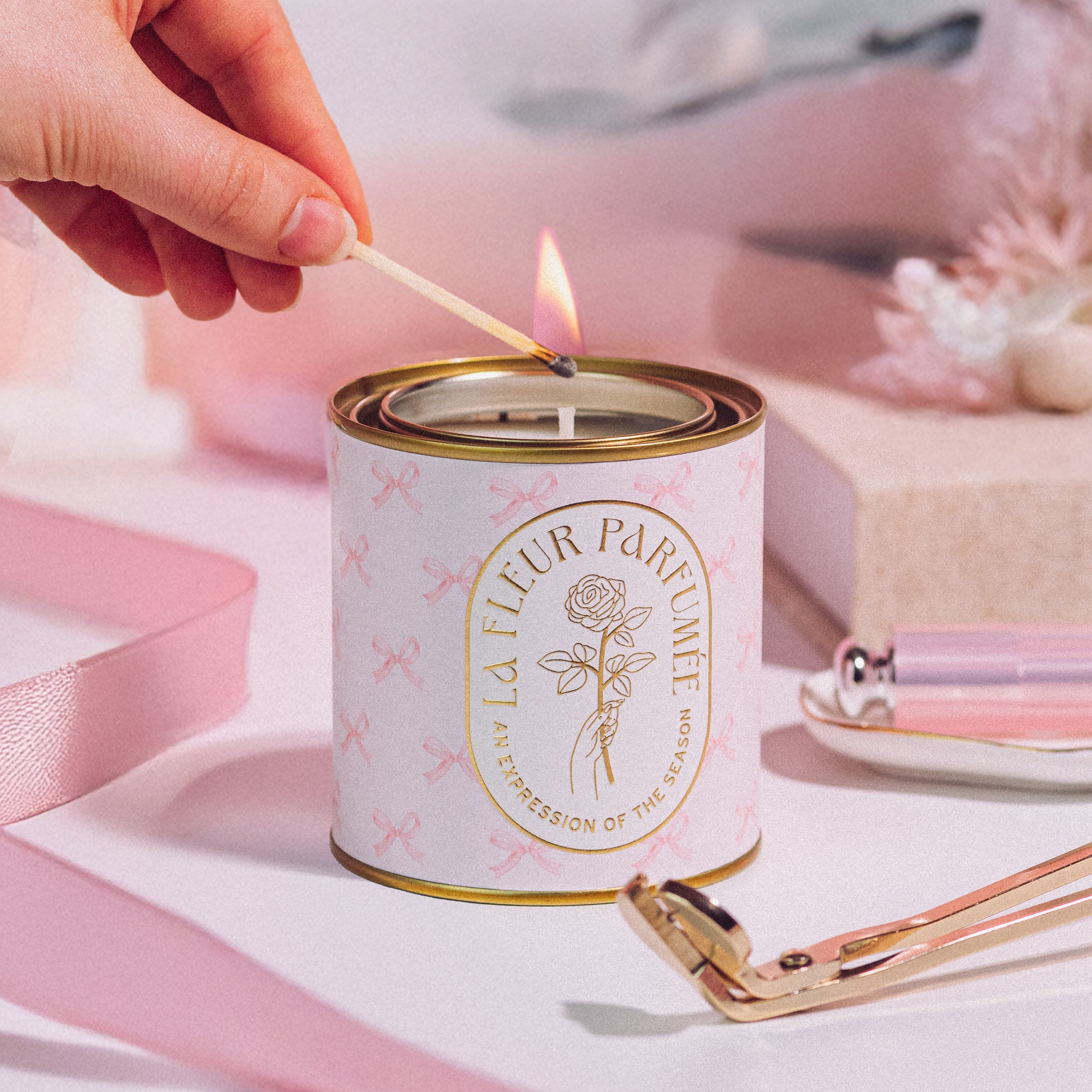 La Fleur Candier clean scented Coquette luxury scented candle with delicate floral fragrance and coquette-inspired artwork. A Parisian chic soft girl aesthetic candle, perfect for gifts for women.