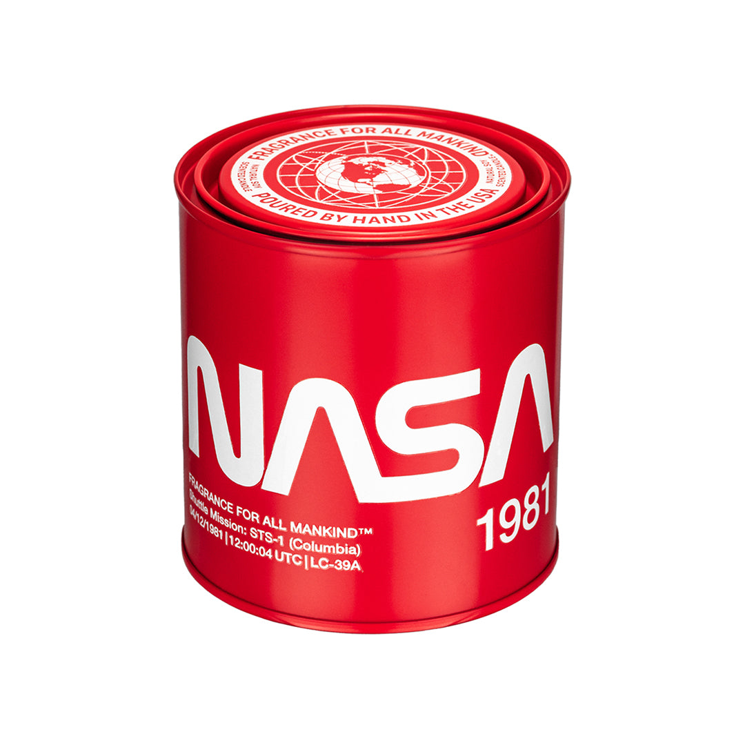 Red NASA 1981 candle with white NASA logo and premium stainless steel canister – A luxury soy wax candle inspired by NASA's 1981 space missions, featuring a bold, masculine scent and BREVRN’s Red Zone™ safety wax.