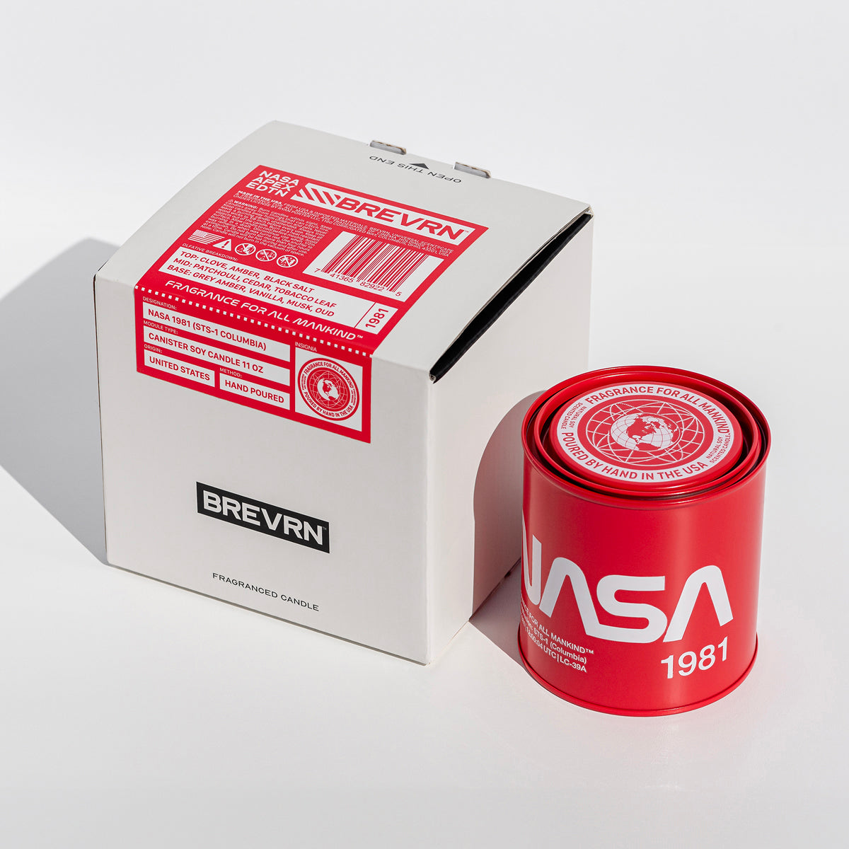 BREVRN NASA 1981 candle next to premium collector’s box – A sleek, design-forward luxury candle, made in the USA, inspired by NASA's pioneering spirit.