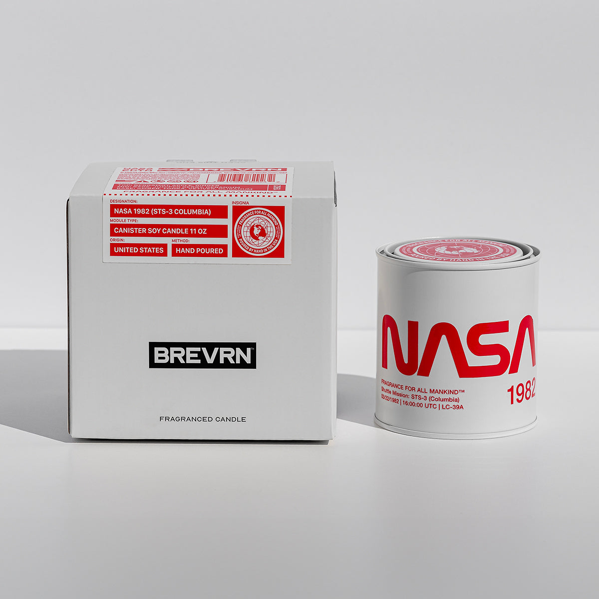 NASA 1982 candle beside high-end presentation box – A modern, masculine candle, perfect for gifting engineers, tech lovers, and space historians.