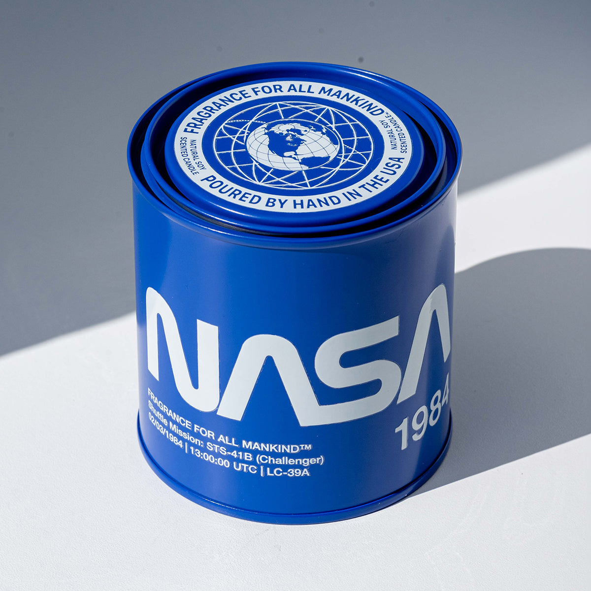 Hand-Poured NASA 1984 Candle by BREVRN. Perfect gifts for husband and collectible art lovers