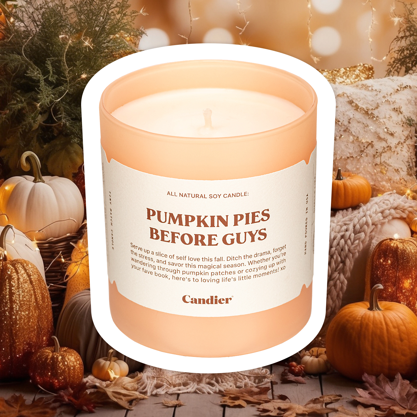 A cute luxury fall scented candle with a label that reads Pumpkin Pies Before Guys, with a background of trendy autumn decor