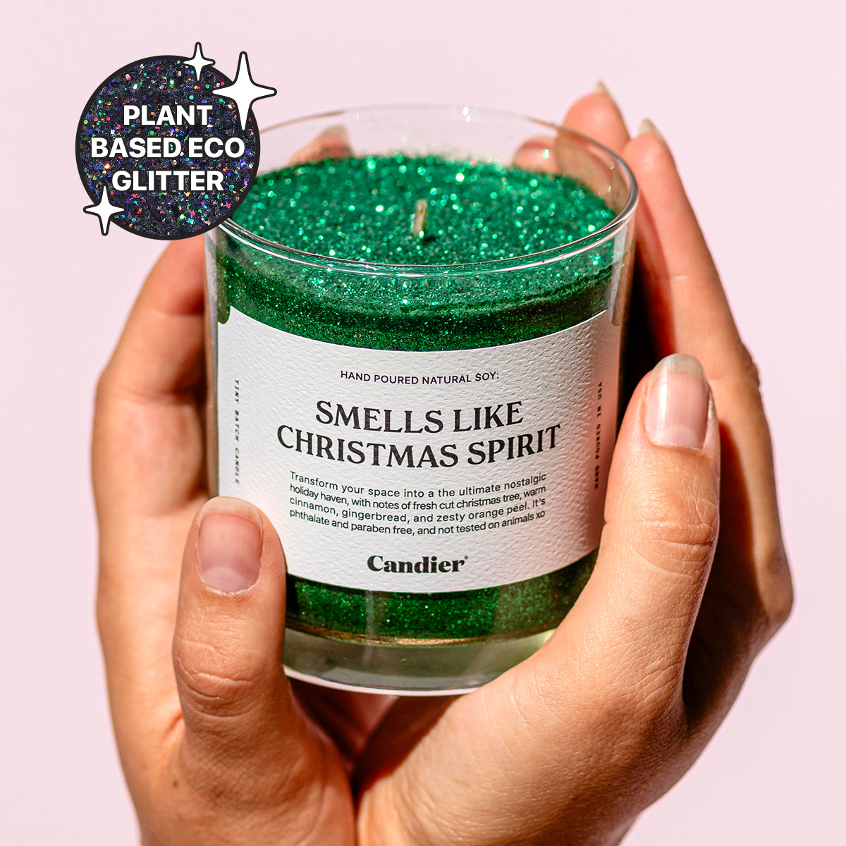 Cute Christmas green glitter scented candle with a label that reads SMELLS LIKE CHRISTMAS SPIRIT by Candier and a badge that says Plant Based Eco Glitter