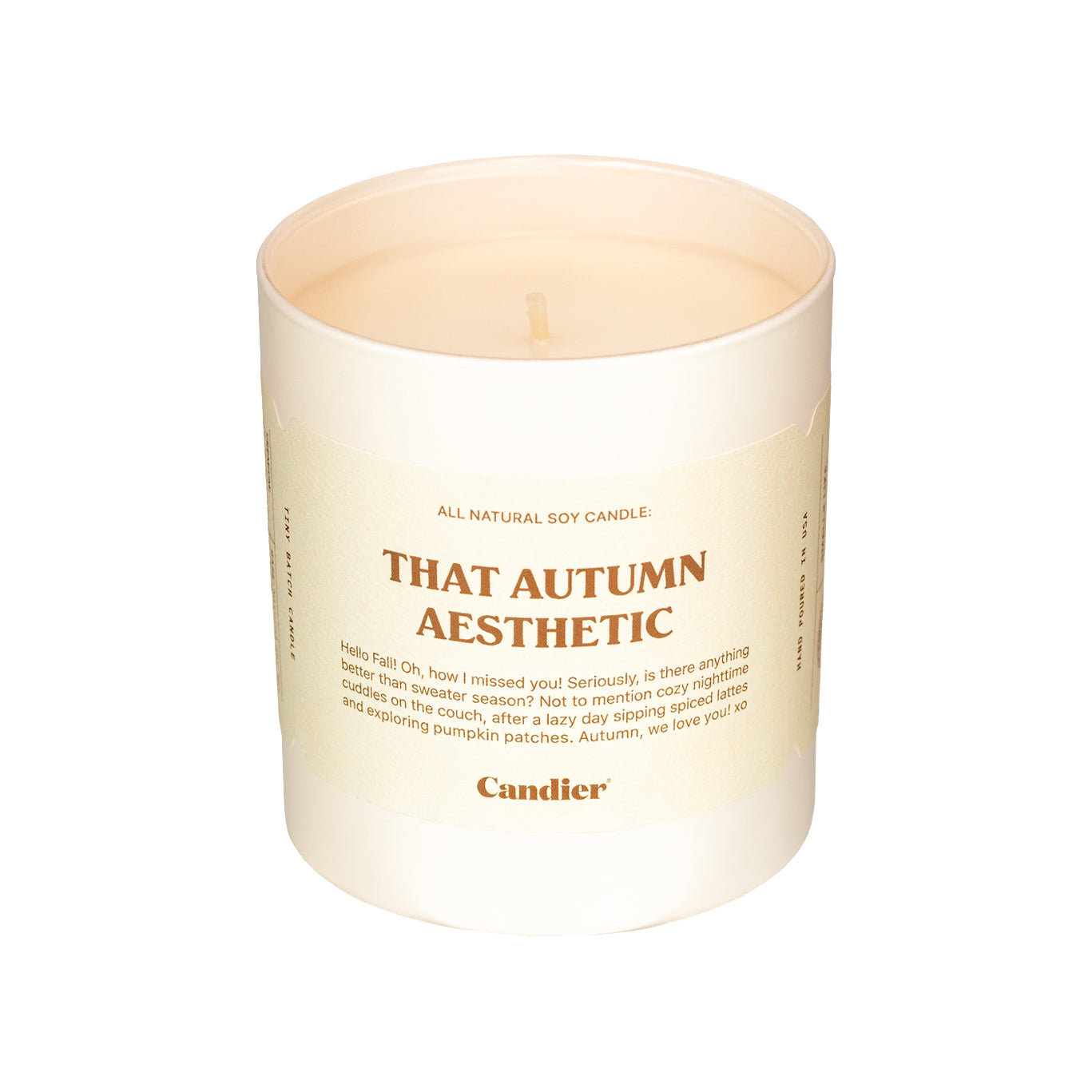 Cozy luxe fall candle with a label that reads That Autumn Aesthetic by CANDIER