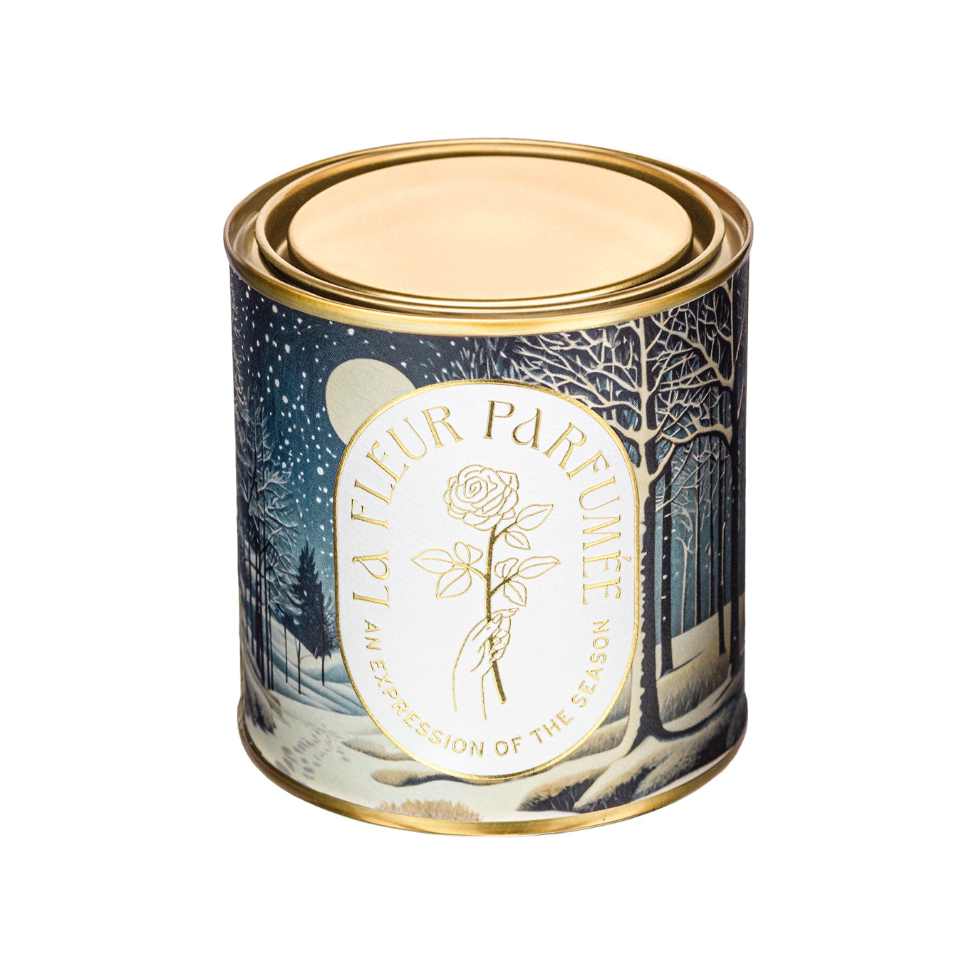 An elegant luxe lgold-tone candle,  wrapped in artwork of a peaceful winter night scene illuminated by the soft glow of the moon, with snow gently falling over a quiet forest. Bare trees stretch upward, their branches dusted with light snow, while soft snowdrifts blanket the ground. Footprints trail off into the distance, adding a sense of wonder. The composition evokes a serene winter’s eve.